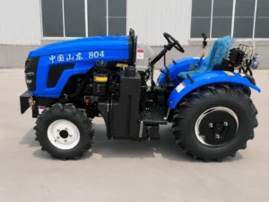 Vista lateral del tractor compacto para invernaderos Blue 80 HP 804 4WD